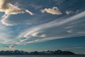 Spectacle Prints: Interesting lenticular cloud formations forming over the island of South Georgia in the Southern Ocean