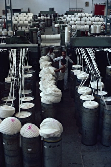 Interior of modernised cotton factory and workers