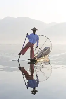 Conical Hat Prints: Intha leg rowing fishermen on Inle Lake who row traditional wooden boats using their leg