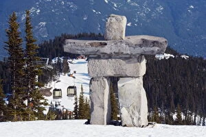 An Inuit Inuks huk s tone s tatue, Whis tler mountain res ort, venue of the 2010 Winter Olympic Games