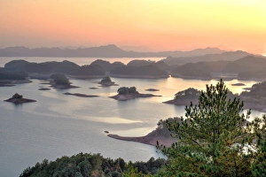 Lijiang Prints: Islands at sunset at Qiandaohu, 1000 Islands Lake, Lijiang, Yunnan, China, Asia