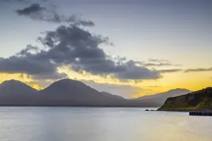 Isle of Jura and Paps of Jura Mountains across Bunnahabhain Bay and Sound of Islay from Islay, Argyll and Bute, Scotland, United Kingdom, Europe
