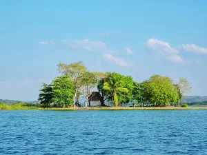 Small Prints: Islet in lake with trees and a small structure near Flores Island in Guatemala