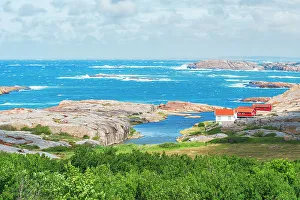 Sweden Prints: Isolated cottages on granite rocks by the sea