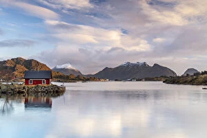 Nordland Gallery: Isolated fishermans cabin reflected in the sea at dawn, Ballstad, Vestvagoy, Nordland county