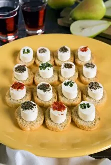 Italian starters with cheese and pot herbs