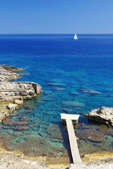Jetty on the beach and boat, Rhodes, Dodecanese, Greek Islands, Greece, Europe