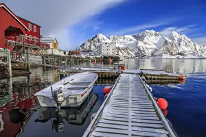 Float Prints: Jetty covered with snow after a night snowfall and boats docked in the harbor of Henningsvaer