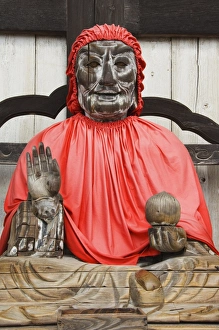 Jizo Prints: Jizo Buddha statue dressed in red cape