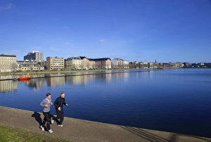 Fitness Prints: Joggers along Sortedams So (Sortedams Lake), Copenhagen, Denmark, Scandinavia, Europe