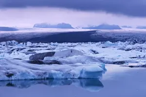 Jokulsarlon Prints: Jokulsarlon glacial lagoon beneath Breidarmerkurjokull (Vatnajokull) glacier which feeds it