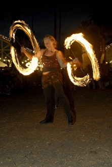 Melbourne Prints: Juggler twirling rods during her performance