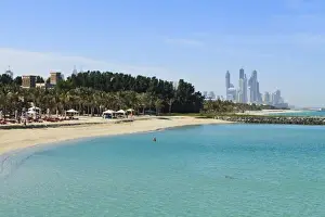 Jumeirah Beach Prints: Jumeirah Beach looking towards the tall buildings of Dubai Marina, Dubai