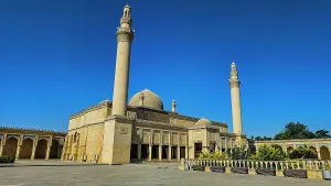 Tall Prints: Jummah Mosque in Shamakhi displays architecture and cultural heritage of Azerbaijan under clear skies