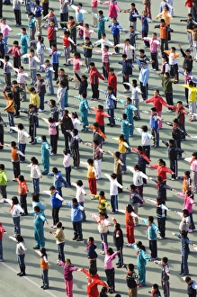 Images Dated 31st October 2007: Junior school children exercising in colourful clothes, Beijing, China, Asia
