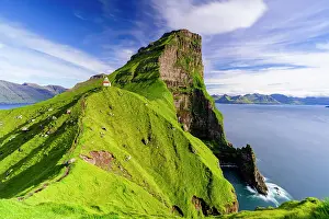 Lighthouses Prints: Kallur lighthouse on cliffs covered with grass with Borgarin mountain peak on background