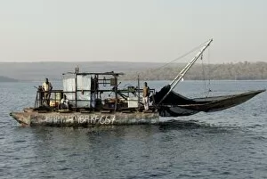 Images Dated 20th August 2010: Kapenta fishing boat and crew, early morning, Lake Kariba, Zimbabwe, Africa