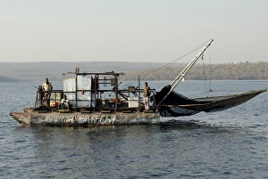 Images Dated 20th August 2010: Kapenta fishing boat and crew, early morning, Lake Kariba, Zimbabwe, Africa