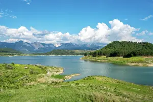 Antalya Prints: Karacaoren dam lake with turquoise water surrounded by trees and mountains under clear blue sky in Turkey