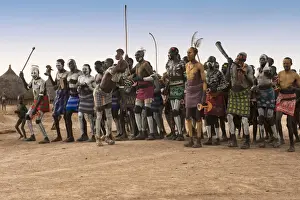 Tribal Culture Prints: Karo people with body paintings participating in a tribal dance ceremony