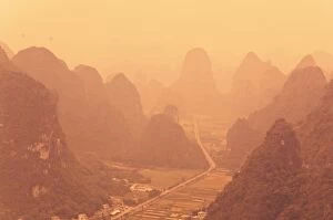 Karst landscape and morning haze, Yangshuo, Guangxi Province, China, Asia