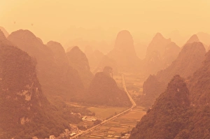 Images Dated 25th October 2005: Karst landscape and morning haze, Yangshuo, Guangxi Province, China, Asia