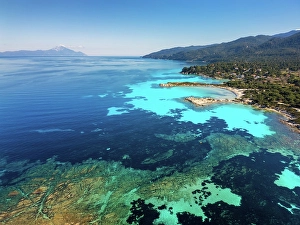 Azure Prints: Karydi beach with turquoise water, drone aerial view, Sithonia, Chalkidiki, Greece