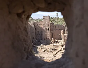 Kasbah ruins seen through an ancient kasbah window, Morocco, North Africa, Africa