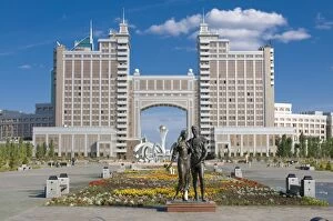 Images Dated 9th September 2009: The Kay Munay Gaz building and the Bayterek monument, Astana, Kazakhstan, Central Asia