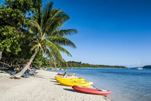 Fiji Prints: Kayaks on the white sand beach of Nanuya Lailai island