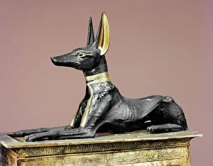 The king in the form of the god Anubis, from the tomb of Tutankhamun, discovered in the Valley of the Kings, Thebes