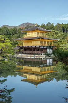 Kinkaku-ji Golden Pavilion Temple reflected in a pond in autumn, UNESCO World Heritage Site, Kyoto, Honshu, Japan, Asia