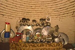Images Dated 13th January 2000: Kitchen ware inside beehive house built of brick and mud