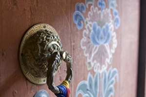 Images Dated 12th April 2009: Knocker at entrance door, Paro Tsechu, Bhutan, Asia