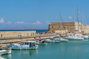 Fishermen Prints: Koules Venetian Fortress and boats in Heraklion Venetian Port during sunny weather in Crete Greece