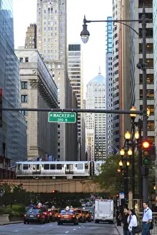 The Loop Prints: L train on elevated track crosses South LaSalle Street in the Loop district