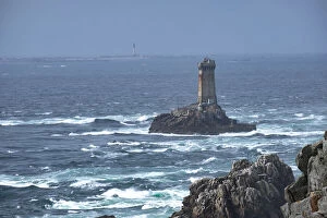 Direction Gallery: La Vieille lighthouse on a lonely rock in the water at Pointe du Raz, Finistere, Brittany, France