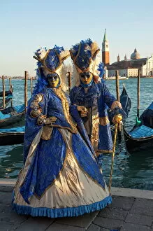 Eye Contact Gallery: Two ladies in blue and gold masks, Venice Carnival, Venice, UNESCO World Heritage Site