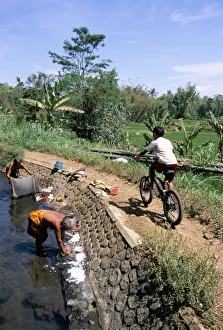 60 65 Prints: Ladies washing in canal near Candi Suimberawan