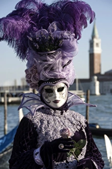 Identity Prints: Lady in black and purple mask and feathered hat, Venice Carnival, Venice, UNESCO