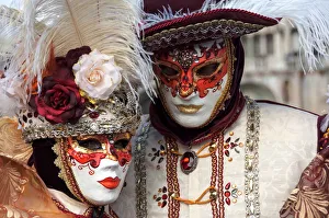 Identity Prints: Lady and gentleman in red and white masks, Venice Carnival, Venice, Veneto, Italy, Europe