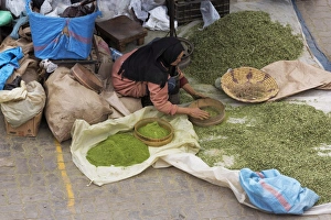 Spices Prints: Lady grinding spices in Rahba Kedima (Old Square)