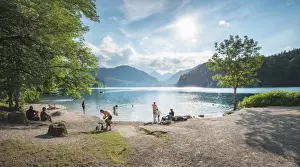 Fuessen Prints: Lake Alpsee near Castle Neuschwanstein and Fuessen town with people enjoying leisure activities