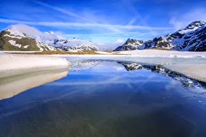 Lake Andossi during spring thaw, Chiavenna Valley, Spluga Valley, Sondrio province