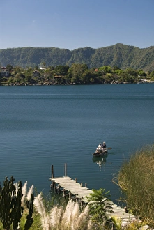 Images Dated 11th February 2010: Lake Atitlan with fishermen in a small boat, near Santiago Atitlan. Guatemala