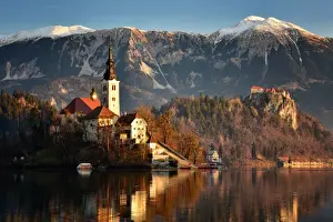 Snowcapped Prints: Lake Bled at dawn with Santa Maria Church (Church of Assumption), Gorenjska, Julian Alps