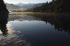 Tasman Prints: Lake Matheson in the evening reflecting a near perfect
