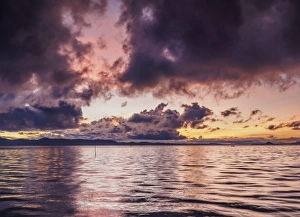 Peruvian Culture Prints: Lake Titicaca at sunrise, Uros Floating Islands, Puno Region, Peru, South America