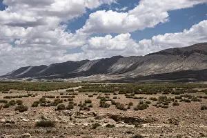 Landscape of Morocco with mountains in the background with white clouds in the sky