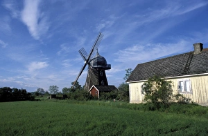 Northern Europe Prints: Landscape with wooden windmill and two houses in
